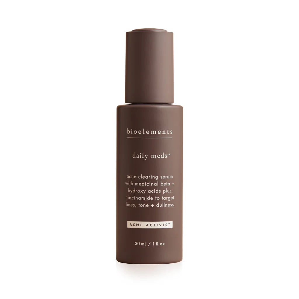 Daily Meds Acne Clearing Serum - Lightweight daily-use serum with 2% salicylic acid, glycolic acid, and niacinamide to clear acne, refine texture, and improve skin tone.
